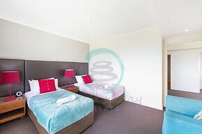 Coastal Elegance Sunset Pool Balcony Dining