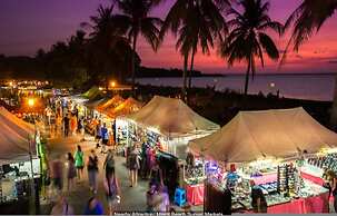 Coastal Elegance Sunset Pool Balcony Dining