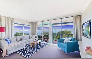 Coastal Elegance Sunset Pool Balcony Dining