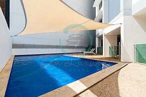 Coastal Magnificence Pool Workspace Parking