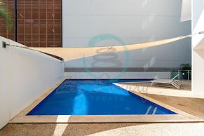 Coastal Magnificence Pool Workspace Parking