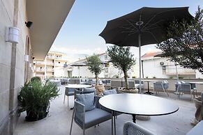 Infinity Hotel & More