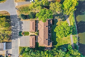 Riverfront Champlin Townhome w/ Deck & Water View!