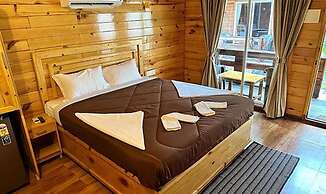 Fabhotel Morjim Cottages