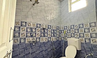 Fabhotel Morjim Cottages