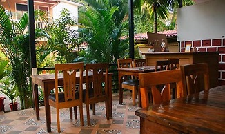 Fabhotel Morjim Cottages