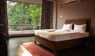 Fabhotel Morjim Cottages