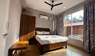 Fabhotel Morjim Cottages