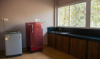 Fabhotel Morjim Cottages