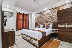 Fabhotel Empire Suites