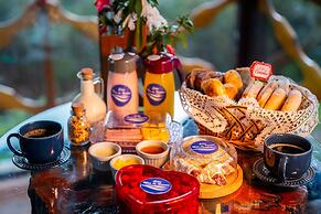 Sítio Mar de Nuvens Chalés de Luxo