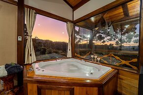 Sítio Mar de Nuvens Chalés de Luxo