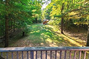 Serene Suttons Bay Home w/ Fire Pit & Wooded Yard
