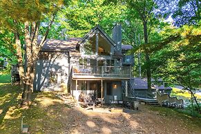 Serene Suttons Bay Home w/ Fire Pit & Wooded Yard