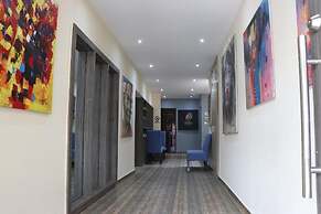 Paragon Gardens & Suites