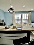 Sky parlor with river view