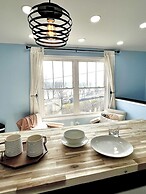 Sky parlor with river view