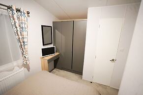 Inviting 3-bed Lodge in Preston hot tub