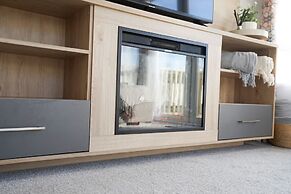 Inviting 3-bed Lodge in Preston hot tub