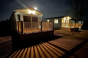 Inviting 3-bed Lodge in Preston hot tub
