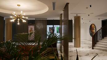 BRICKSPOINT BOUTIQUE APARTHOTEL ASOKORO