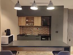 BRICKSPOINT BOUTIQUE APARTHOTEL ASOKORO