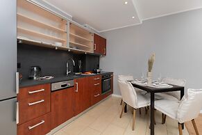 Długie Ogrody Apartment by Renters