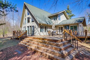 Lakefront Neillsville Home w/ Fire Pit, Game Room!