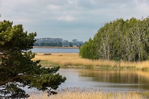 Turquoise Apartment Rogowo by Renters