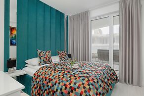 Turquoise Apartment Rogowo by Renters
