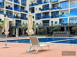 WelHome - Prime 1BR Apartment at Oia Residence