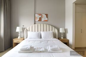 WelHome - Prime 1BR Apartment at Oia Residence