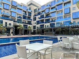WelHome - Prime 1BR Apartment at Oia Residence