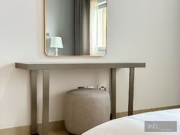 WelHome - Prime 1BR Apartment at Oia Residence