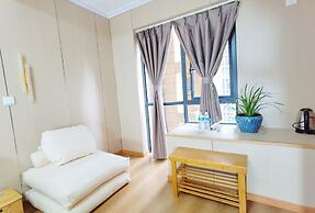 Orange Mingwu Hotel with Cat Cafe