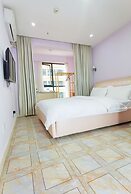 Orange Mingwu Hotel with Cat Cafe