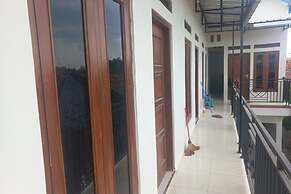 SPOT ON 93815 Chimi Rumah Kost