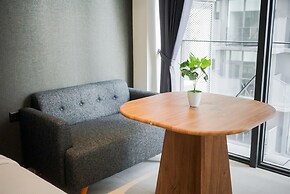 Studio Apartment With Sofa At Carstensz Residence