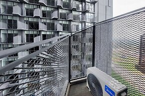 Studio Apartment With Sofa At Carstensz Residence