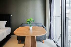 Studio Apartment With Sofa At Carstensz Residence