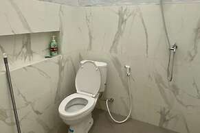 SPOT ON 93832 Lies Kostel Syariah