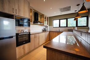 Trademark Suites at Enaki Town