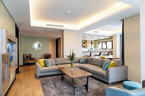 Trademark Suites at Enaki Town