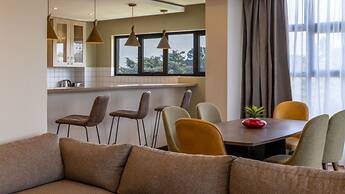 Trademark Suites at Enaki Town