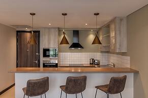 Trademark Suites at Enaki Town
