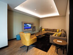 Trademark Suites at Enaki Town