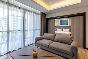 Trademark Suites at Enaki Town