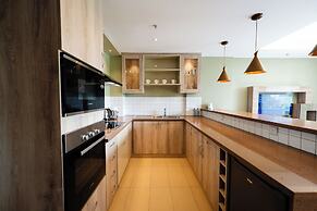 Trademark Suites at Enaki Town