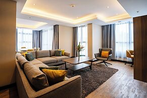 Trademark Suites at Enaki Town
