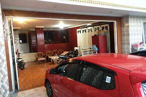 SPOT ON 93880 Guest House Bu Iin Syariah